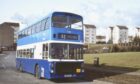 A blue nd white Volvo Ailsa bus, the 247, heads up Fintry Road, Dundee, in 1984