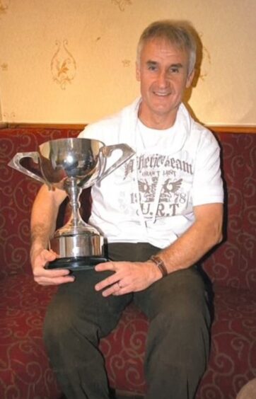 Alex Joiner with his Scottish Twinshock Champion trophy in 2009.