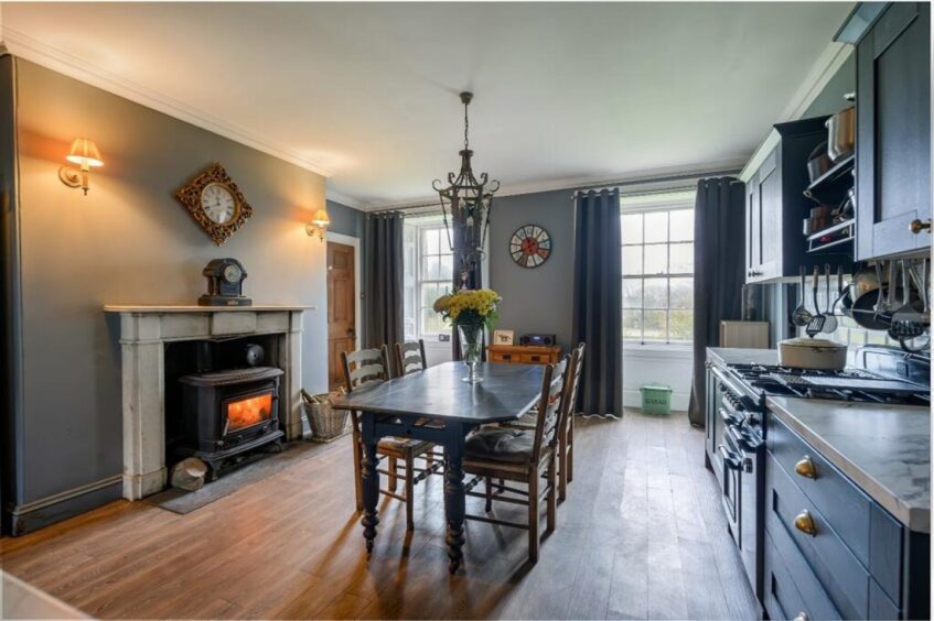 The kitchen also boasts a fire and space for a dining table.