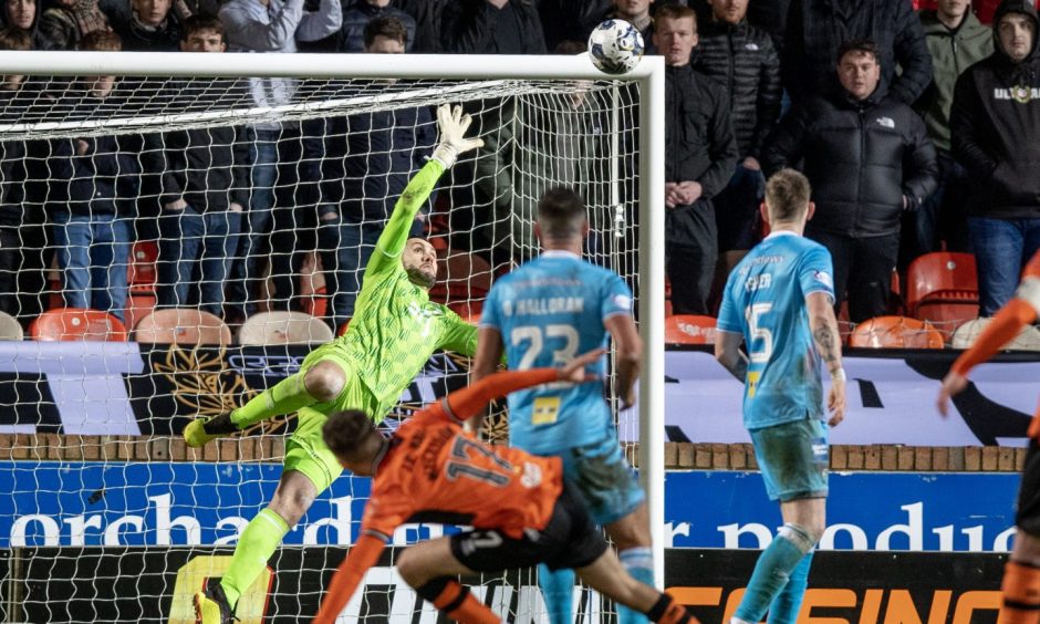 Dunfermline keeper Deniz Mehmet claws the ball away from the top corner of his goal in the recent goalless draw with Dundee United. 