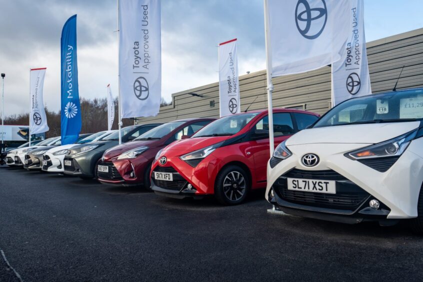 line of Toyota cars at new centre in Perth