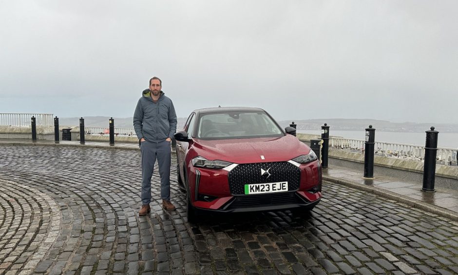 Jack McKeown beside the DS3 with the River Tay in the background