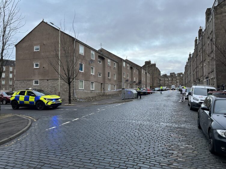 Officers at the scene outside Morgan Street in Dundee