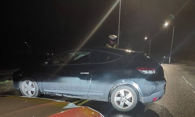 A car was found parked sideways by police in Kirkcaldy.