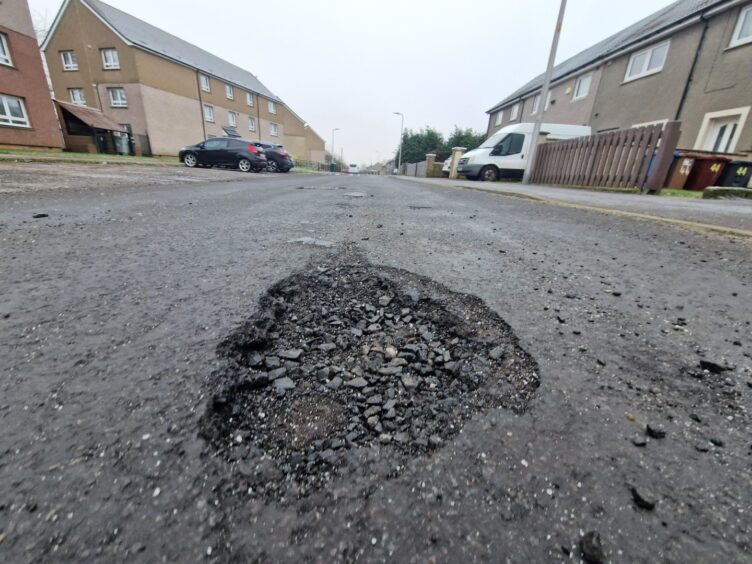 Finlow Terrace is littered with potholes.