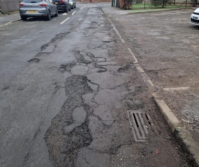 The Fintry street is covered by 'craters'