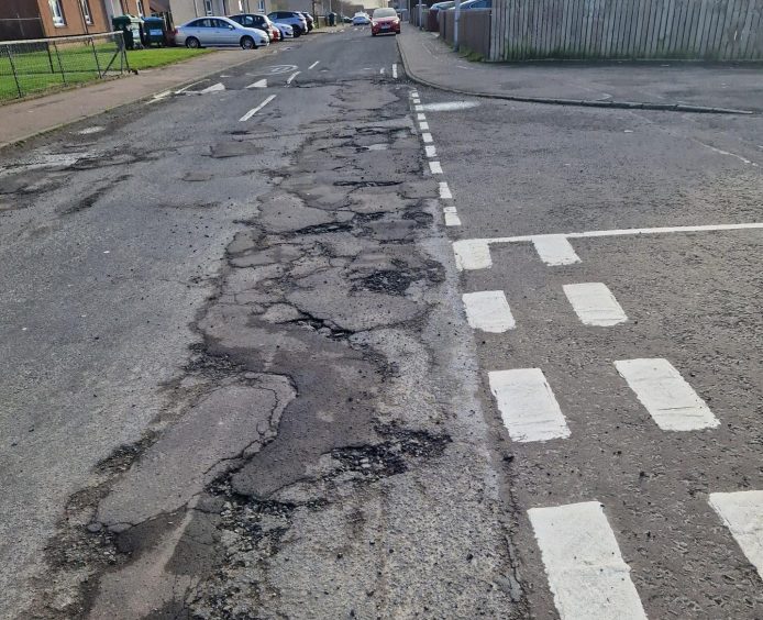 Potholes along Finlow Terrace in Dundee