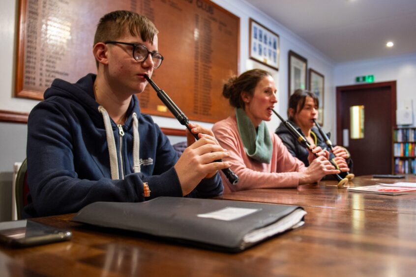 Brechin Pipe Band members practising.