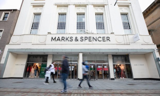 Police are investigating one of the assaults outside Marks and Spencer on Murraygate. Image: Kim Cessford/DC Thomson