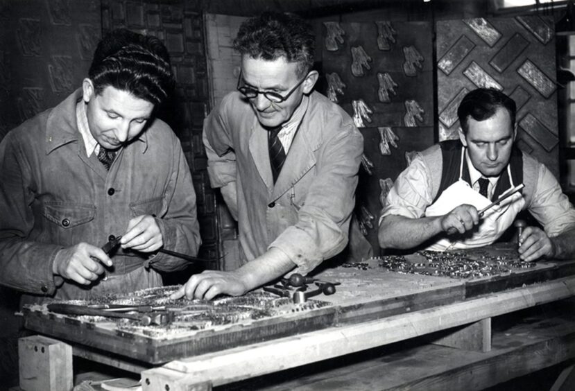 David Pettigrew, Bob Beveridge and John Hunter, blockcutters at Barry, Ostlere and Shepherd, Kirkcaldy c.1952.