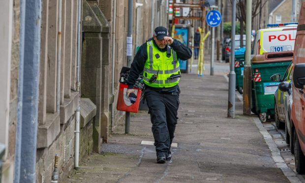 Police on Morgan Street on Tuesday. Image: Kenny Smith/DC Thomson