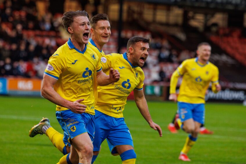 Dan O'Reilly celebrates with team-mates Euan Murray, Lewis Vaughan and Liam Dick after opening the scoring for Raith Rovers in the Fife derby. Image: Kenny Smith/DC Thomson.
