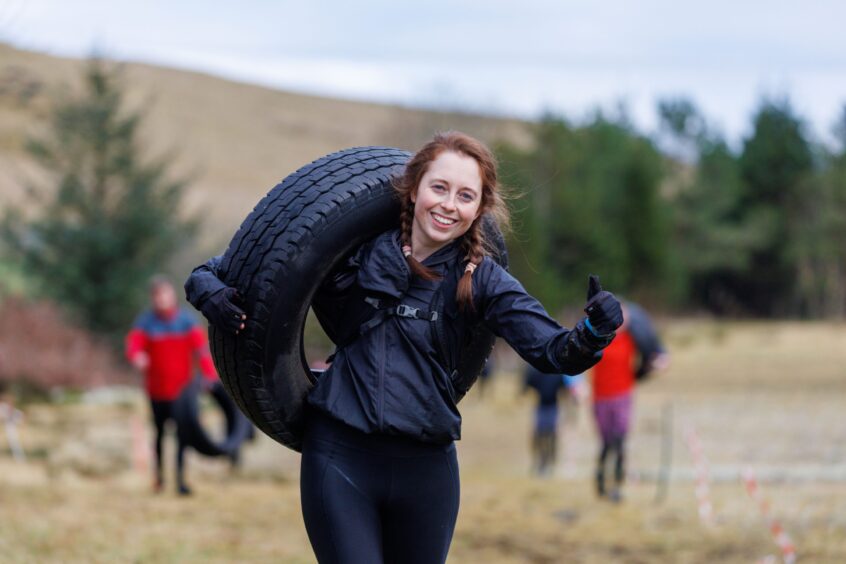 A competitor still finding the energy to smile.