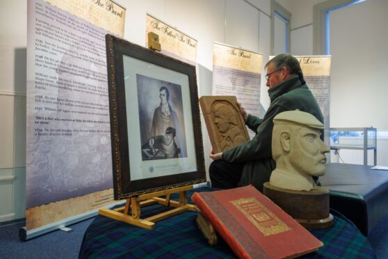 Montrose Burns Club past president Dave Clark with the sculpture of the Bard. Image: Kenny Smith/DC Thomson