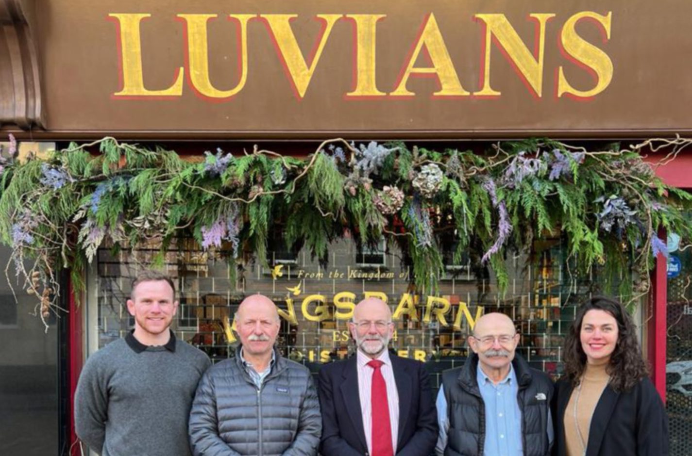 Chris Fusaro, Luigi Fusaro, Vincent Fusaro, Anthony Fusaro and Emili Fusaro outside the Luvians St Andrews bottle shop. Image: Luvians