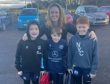 Martel and her three boys at a Dundee Eagles rugby match.
