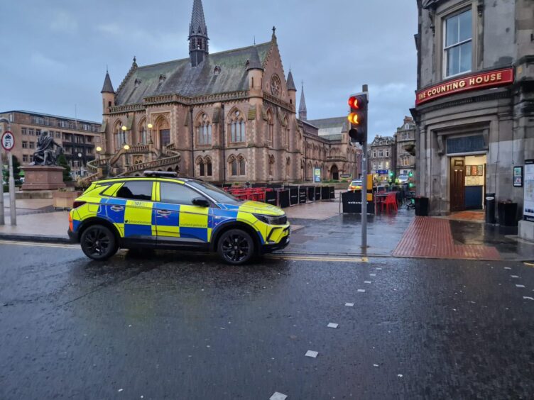 A third police vehicle at Albert Square in Dundee 