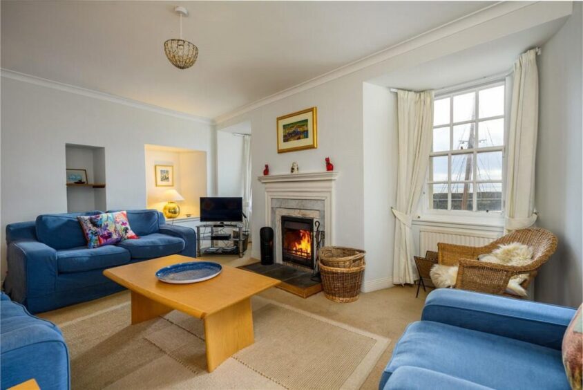 The sitting room has exceptional harbour views.