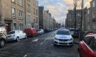 Police remain on Morgan Street, Dundee., for several hours. Image: James Simpson/DC Thomson