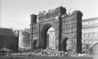 The Royal Arch being pulled down in February 1964.