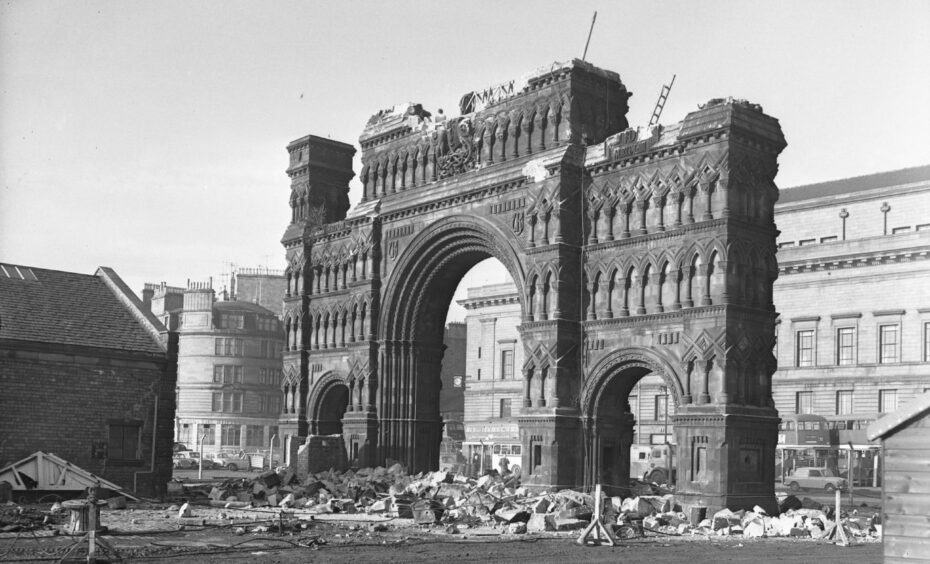 The Royal Arch being pulled down in February 1964.