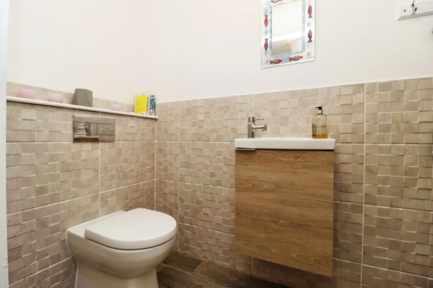 A small bathroom and utility room completes the ground floor. 