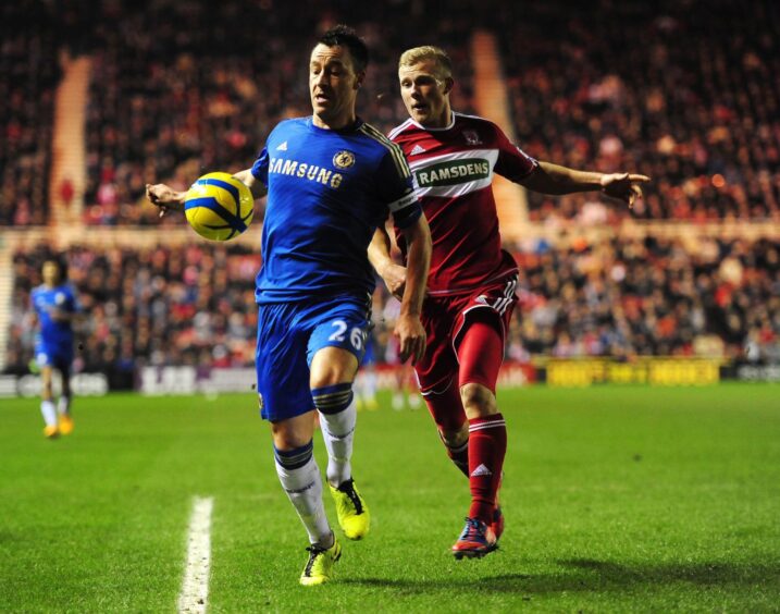 Curtis Main challenges Chelsea skipper John Terry in an FA Cup tie while with Middlesbrough. Image: PA