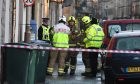 Police and firefighters at the scene of fire at Scott Street, Perth.