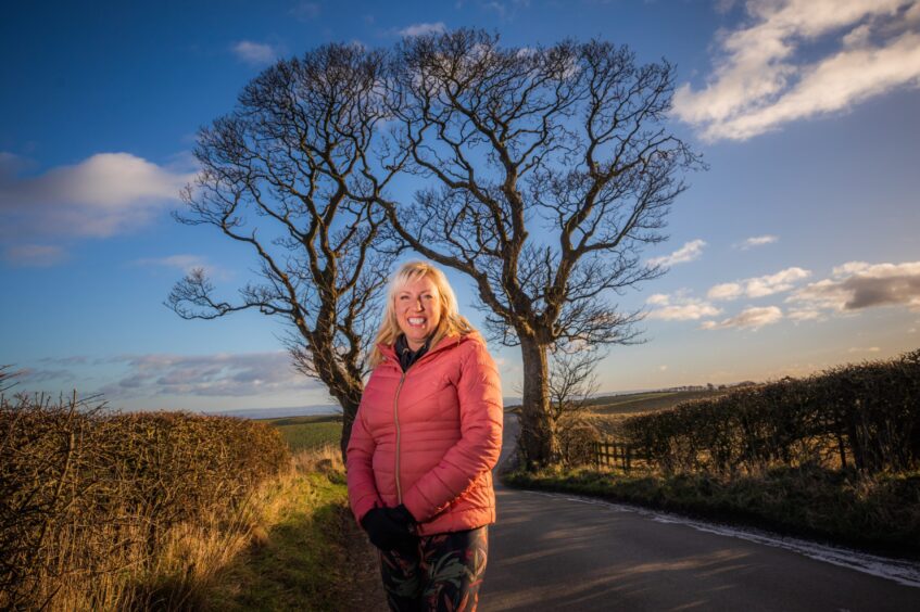 Christine Cunningham-Smith loves the walk past the kissing trees behind Kinghon Loch. 