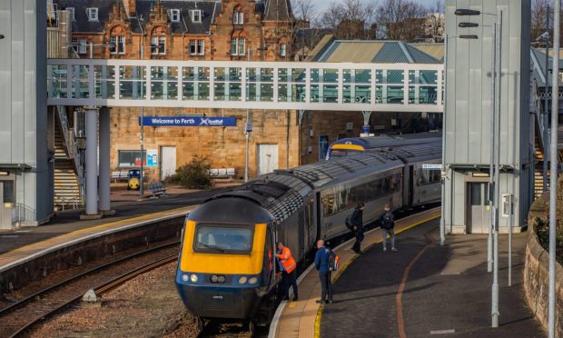 A ScotRail train departs from Perth