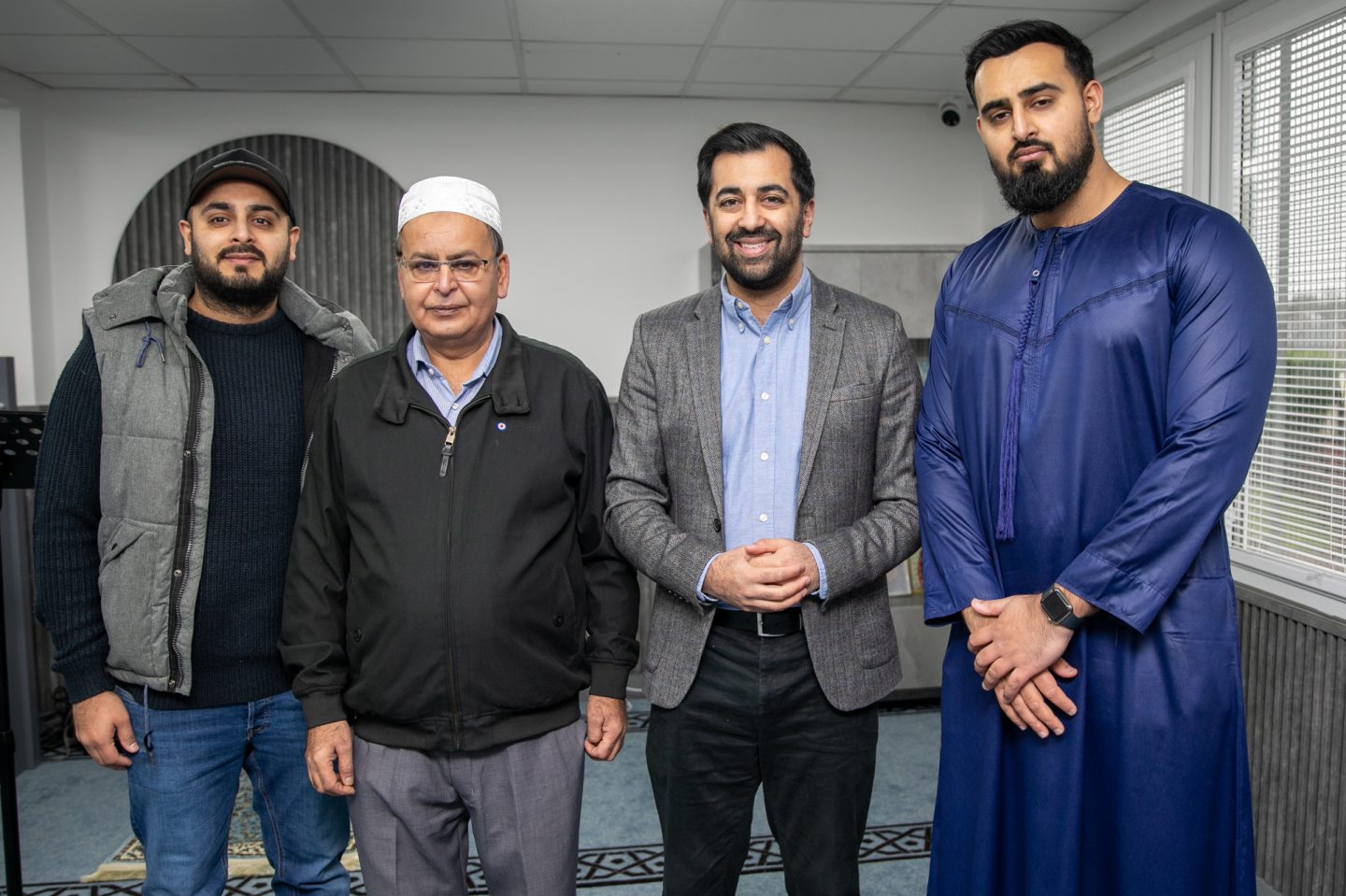 Faisal, Mohammed Naseem, First Minister Humza Yousaf and Adil Naseem inside the Mosque.