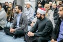 Humza Yousaf, pictured visiting a new mosque in Arbroath, wants the UK Government to use its influence. Image: Steve Brown/DC Thomson.