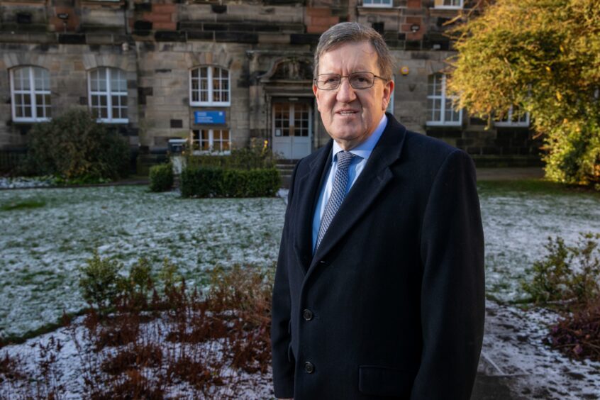 Lord George Robertson outside Dundee University