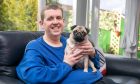 Dunfermline man Peter Gray with dog Daisy after his incredible 12 stone weight loss