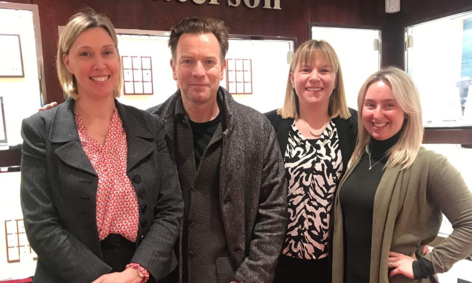 Ewan McGregor with the team at T. Paterson Jewellers.