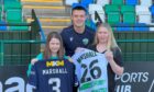 Rebecca Redmond (right) and her sister Scarlett travelled with her family to meet former Dundee star Jordan Marshall.