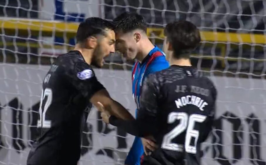 Tony Watt of Dundee United celebrates in the face of Inverness' Morgan Boyes
