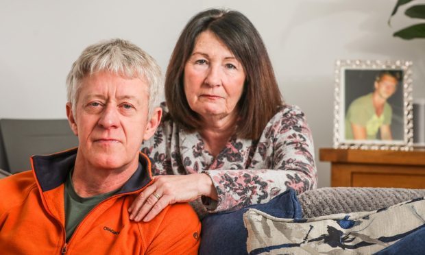 Davy Cornock and wife Margaret at home in Ferryden, Montrose. Davy has been continuing to push for an investigation into the unexplained death of his son, David, who died aged 37 in Thailand in 2019. Image: Mhairi Edwards/DC Thomson