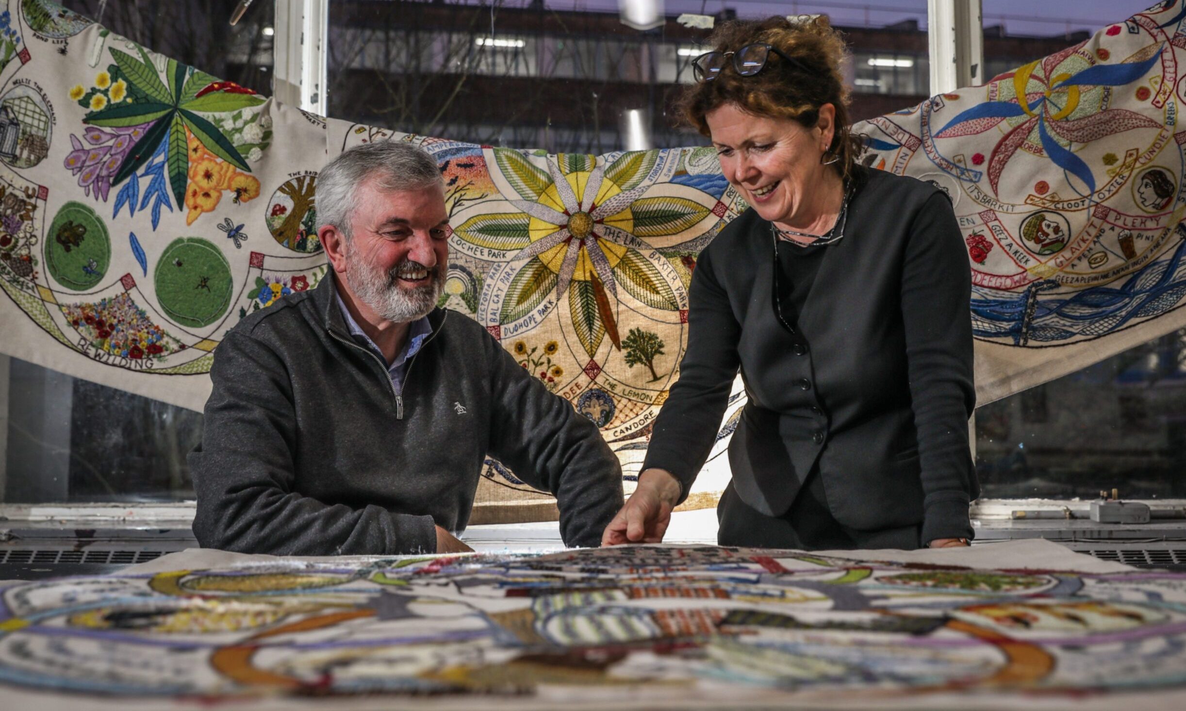 John Fyffe and Dr Frances Stevenson have been heavily involved with the Dundee Tapestry which reveals the citys past, present and future through eight illustrative themes. Image: Mhairi Edwards/DC Thomson