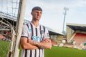 Dunfermline Athletic loan signing Brad Holmes leans against a goalpost at East End Park.