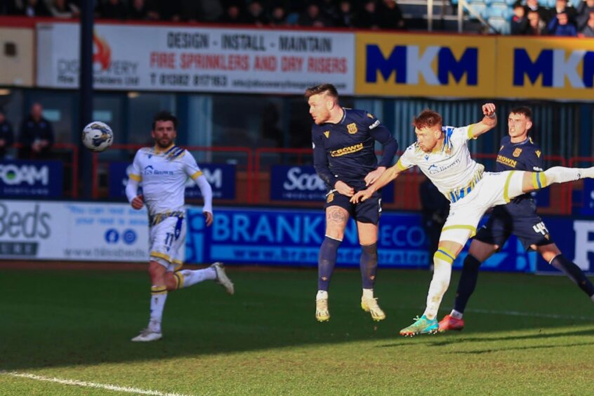 McGhee finds the corner with a fine header. Image: Shutterstock/David Young