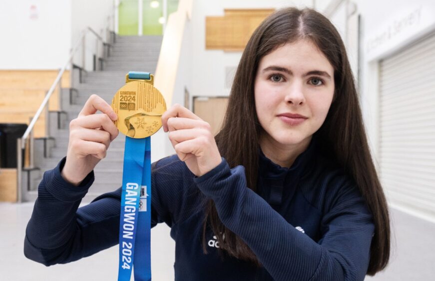 Callie Soutar curling gold medal at Youth Winter Olympics.