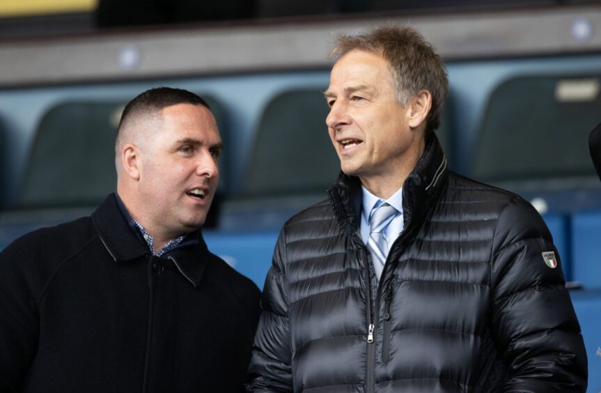 Mark Fotheringham, left, and Jurgen Klinsmann on scouting duty