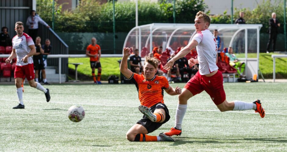Dundee United teenager Rory MacLeod in action for the Tangerines against Spartans last July
