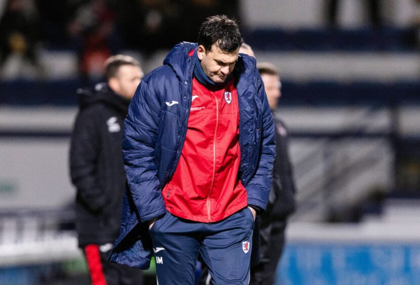 Raith Rovers manager Ian Murray looks down at the ground in pensive mood.