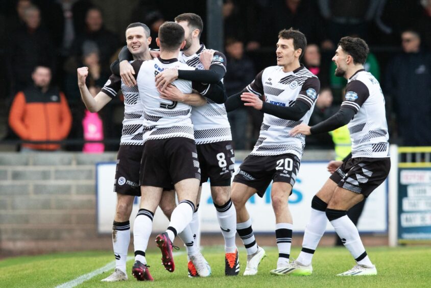 Ayr stars celebrate Jamie Murphy's opener against Dundee United 