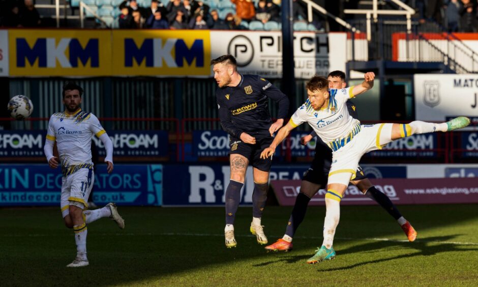 Jordan McGhee sees Dundee defeat St Johnstone thanks to his late header. Image: SNS