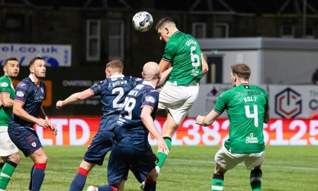 Dundee United's Ross Graham heads a decent opportunity narrowly wide against Raith Rovers