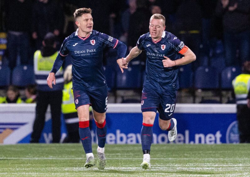 Raith Rovers duo Euan Murray and Scott Brown run back after the latter's winning goal against Dundee United.