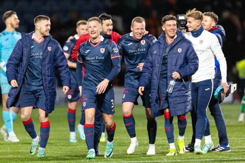Raith Rovers players celebrate after captain Scott Brown fires them to victory against Dundee United.
